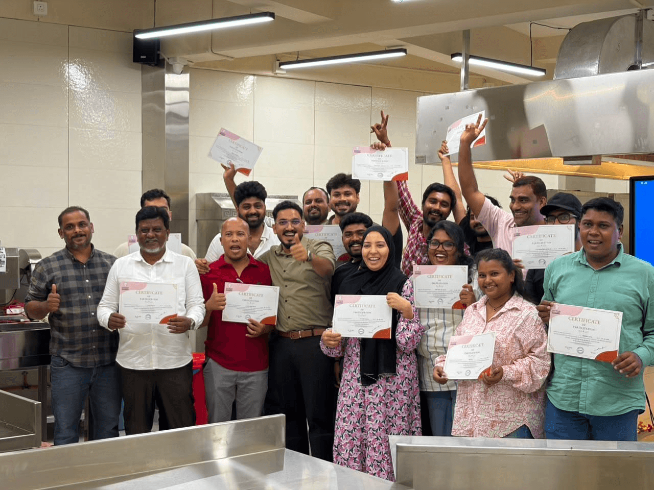 Entrain Academy students gathered during a hands-on culinary workshop
